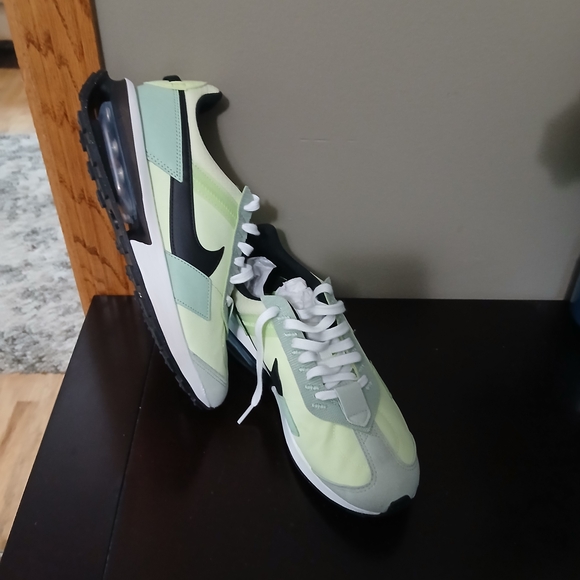 nike black and neon green sneakers